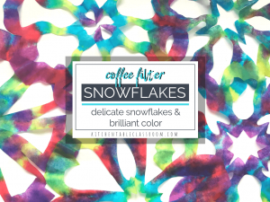 These colorful watercolor snowflakes are cut from coffee filters! Coffee filter snowflakes are easy for little hands to cut & perfect for celebrating winter