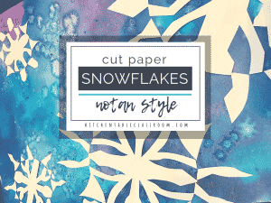 These cut paper snowflakes are inspired by Japanese notan art. Use the free printable snowflake template to get started today!
