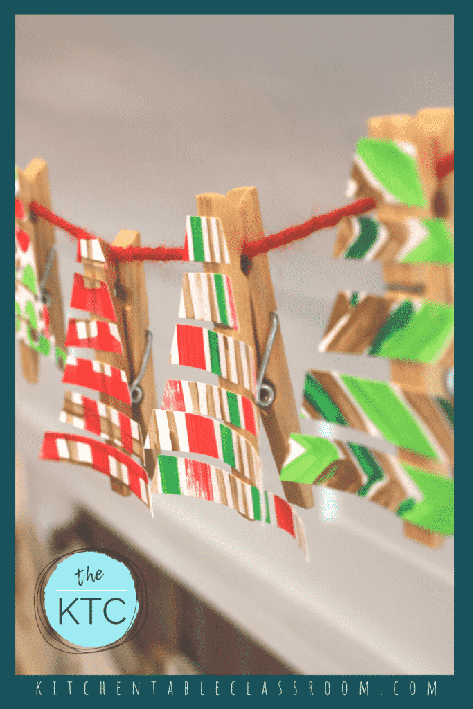 Clothespins are a super easy way to make this easy paper Christmas garland.