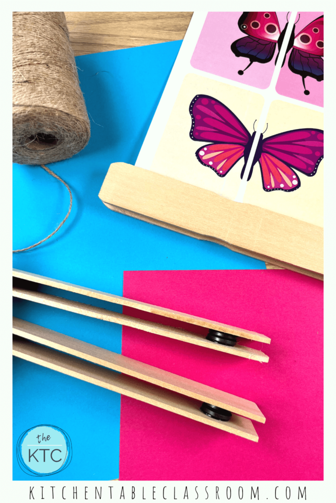 Paint stir sticks and magnets create this easy to change photo display hanger!