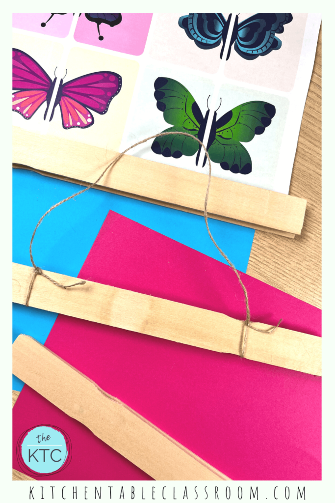 Paint stir sticks and magnets create this easy to make wooden photo hanger.