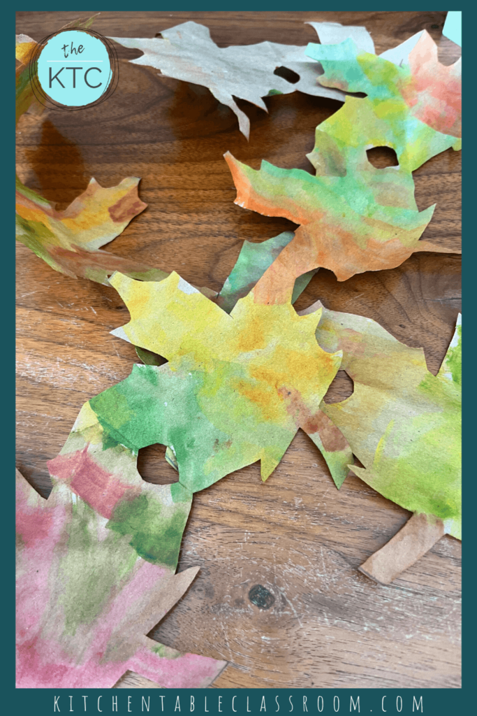A few simple folds and snips and you can learn how to cut a paper leaf garland!