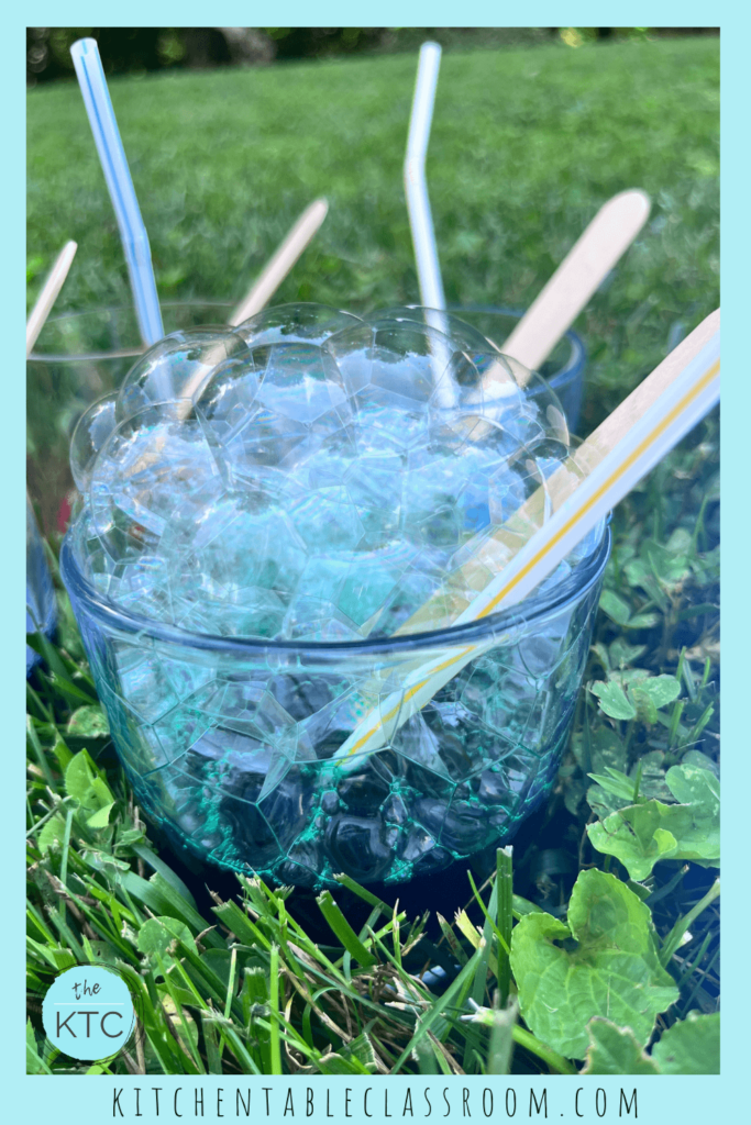 Add food coloring to bubble solution and have a blast making bubble art