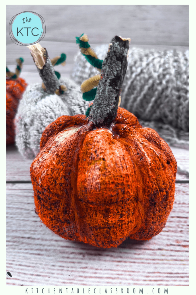 Up-cycle socks into these adorable soft pumpkin sculptures for a perfect fall craft!
